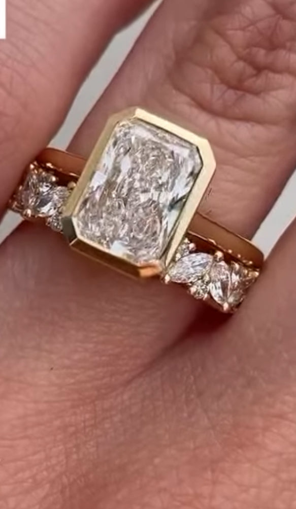 3 Carat Radiant Cut with a solitaire band and bezel setting