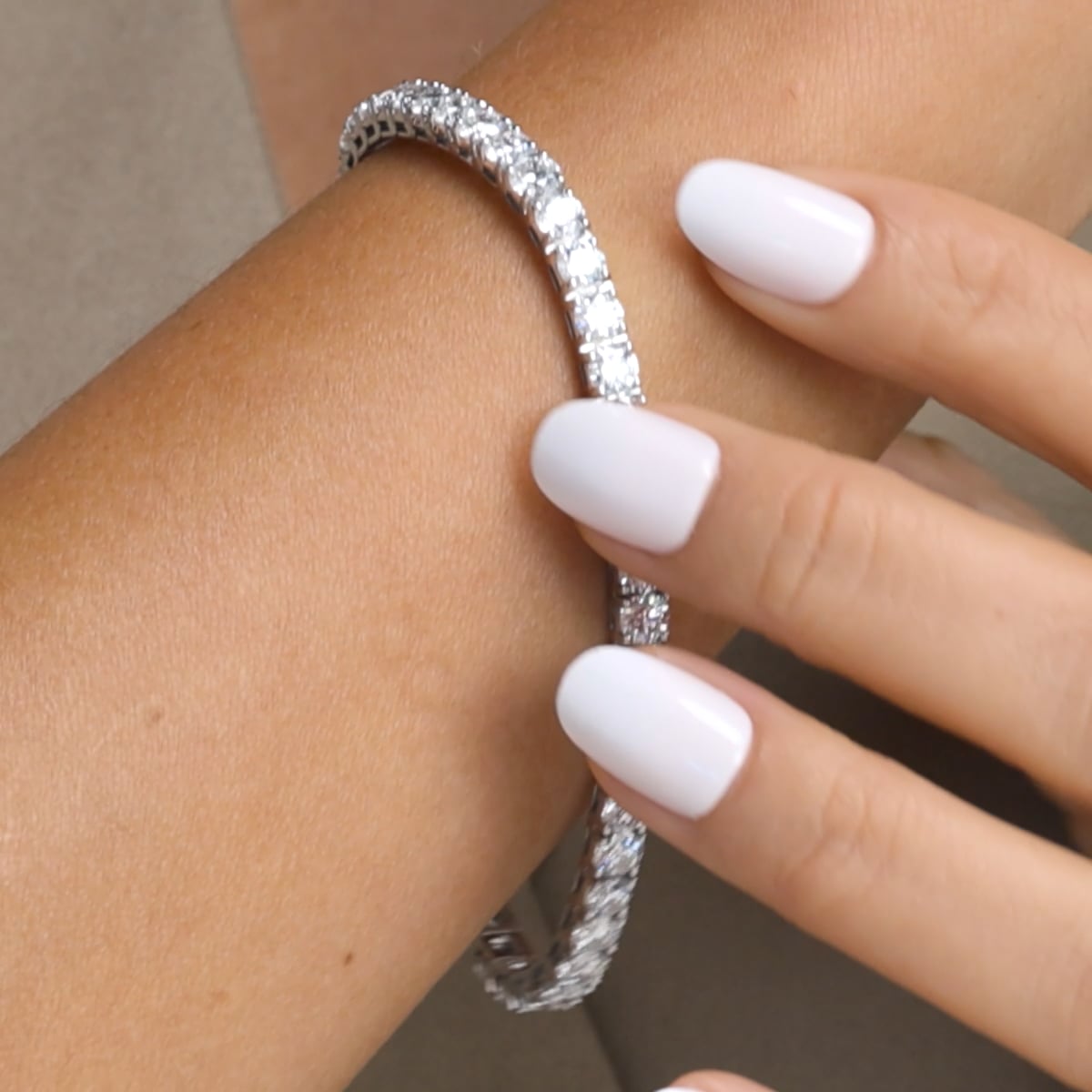 Round Moissanite Four-Prong Tennis Bracelet