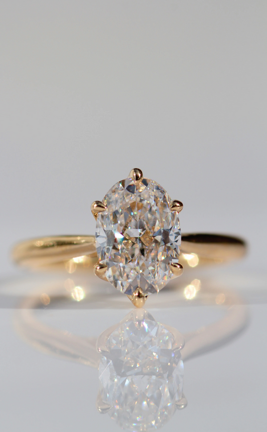 2 Carat Oval Cut with Hidden Accents and Unique Petal Setting