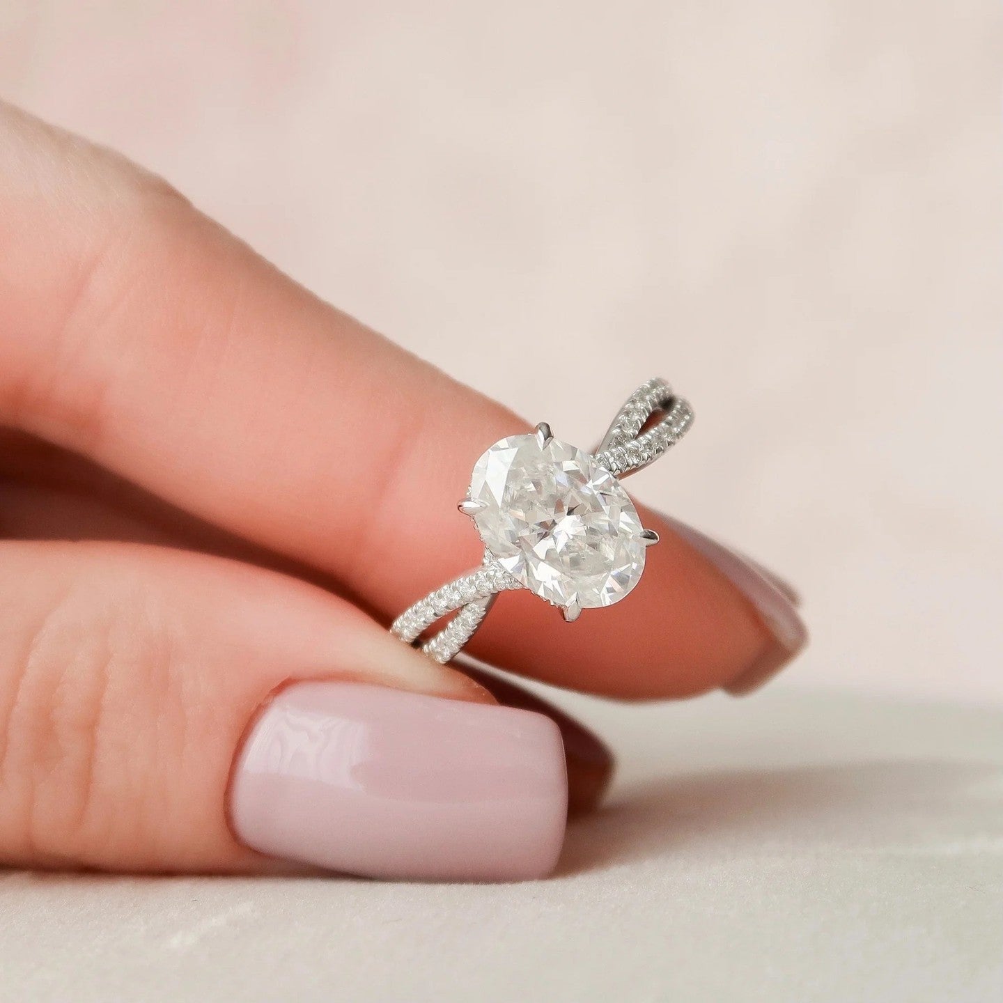 2.0 Carat Oval Cut Diamond Ring with Twisted Band and Pave Detail