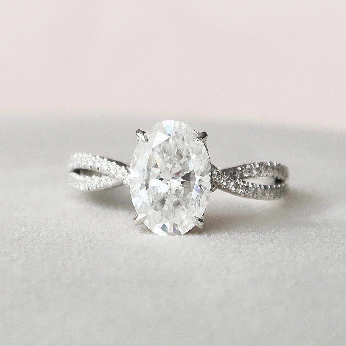 2.0 Carat Oval Cut Diamond Ring with Twisted Band and Pave Detail