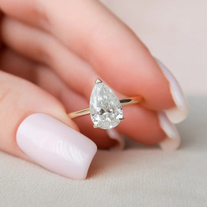 3 Carat Pear Cut with a Solitaire Band, Hidden Halo and Shoulder Accents