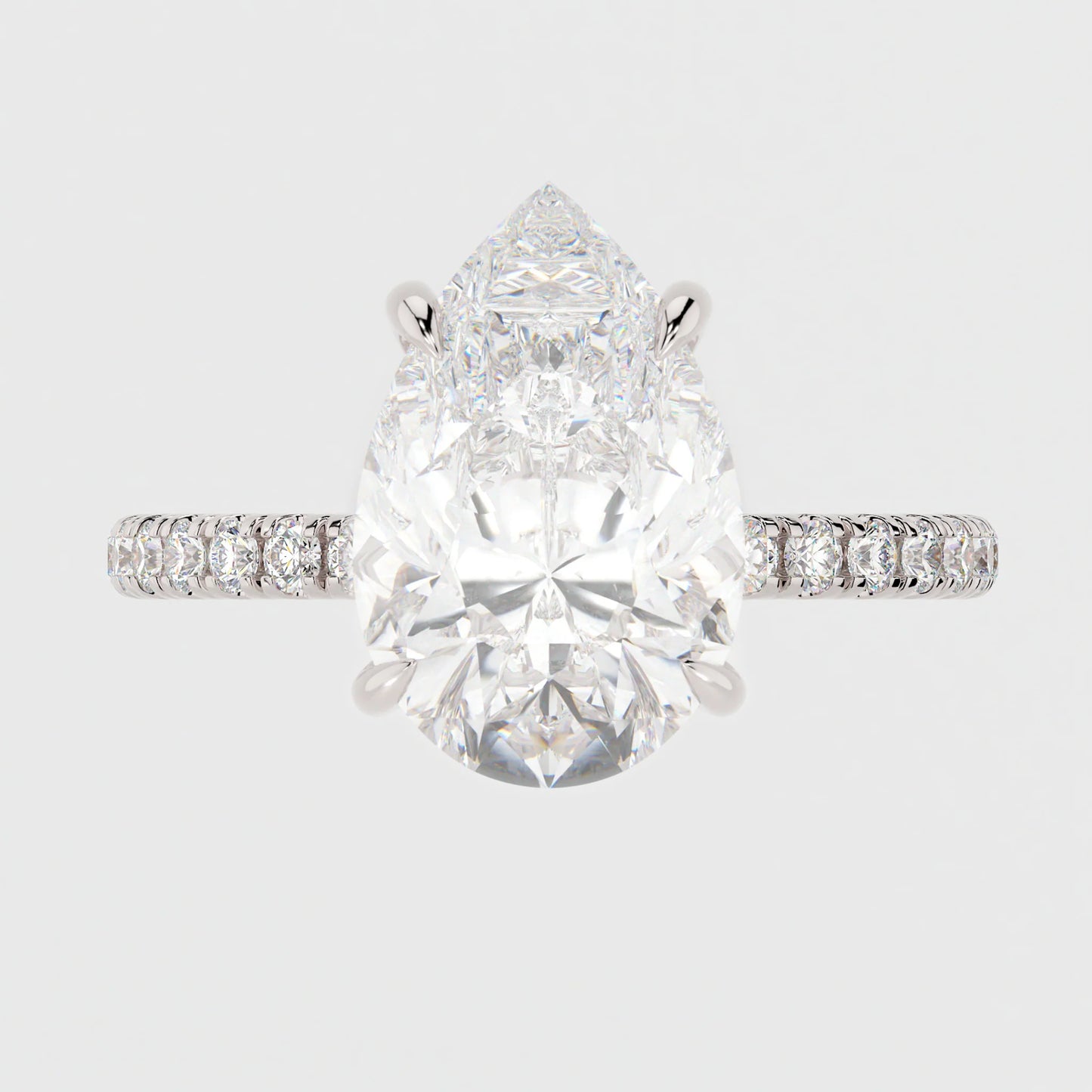 3 Carat Pear Cut Hidden Halo Moissanite Diamond Engagement Ring with a Pavé Band