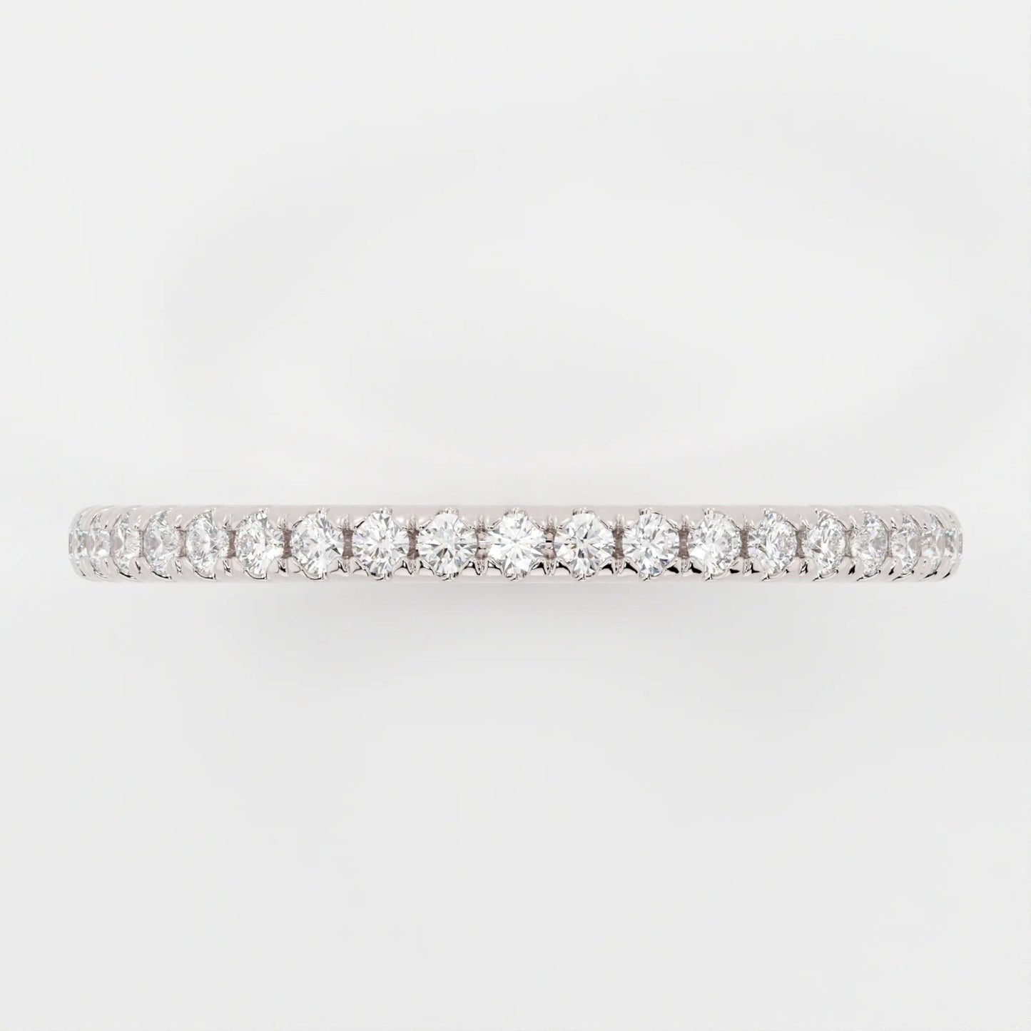 (.75 CT T.W.) Round Cut - Shared Prongs - Reflections Jewelers