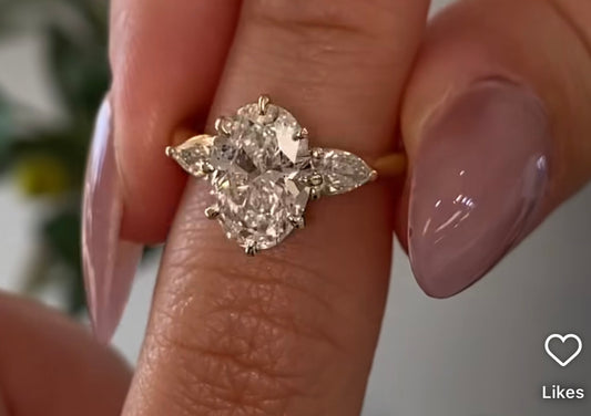 3-Stone Oval Ring with pear side stones and a shoulder accent (Custom)