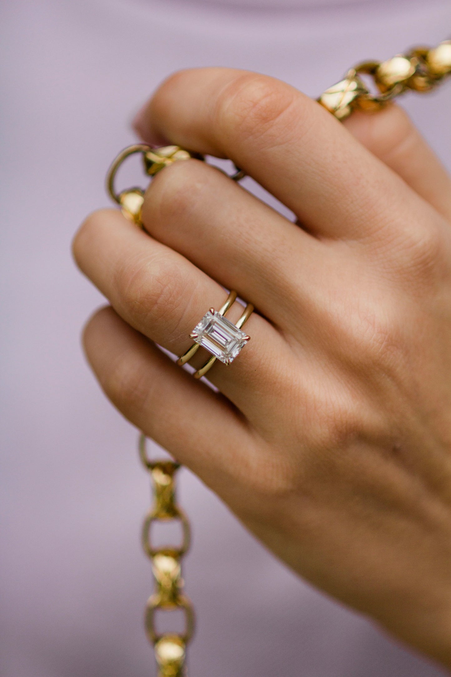 4 Carat Emerald Cut Moissanite Diamond Engagement Ring with a Squared Off Solitaire Band