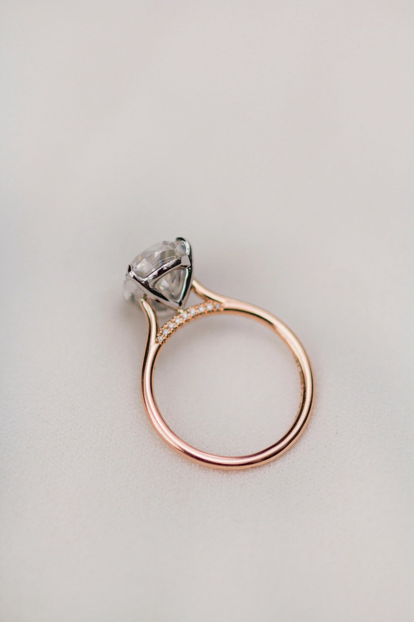 3 Carat Pear Cut Moissanite Diamond Engagement Ring with a Solitaire Band and Shoulder Accents