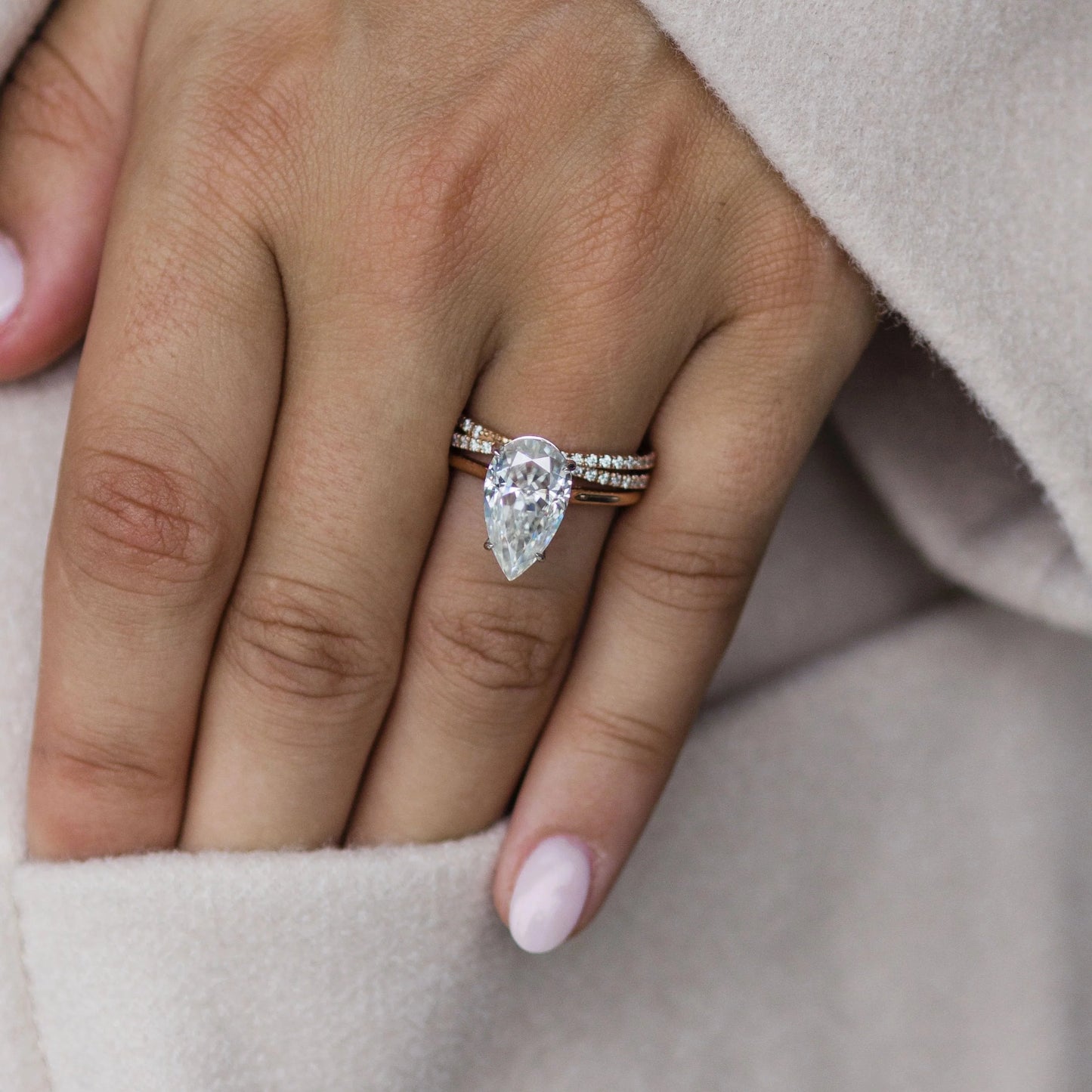 3 Carat Pear Cut Moissanite Diamond Engagement Ring with a Solitaire Band and Shoulder Accents