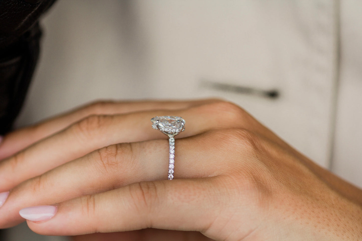 3 Carat Pear Cut Hidden Halo Moissanite Diamond Engagement Ring with a Pavé Band