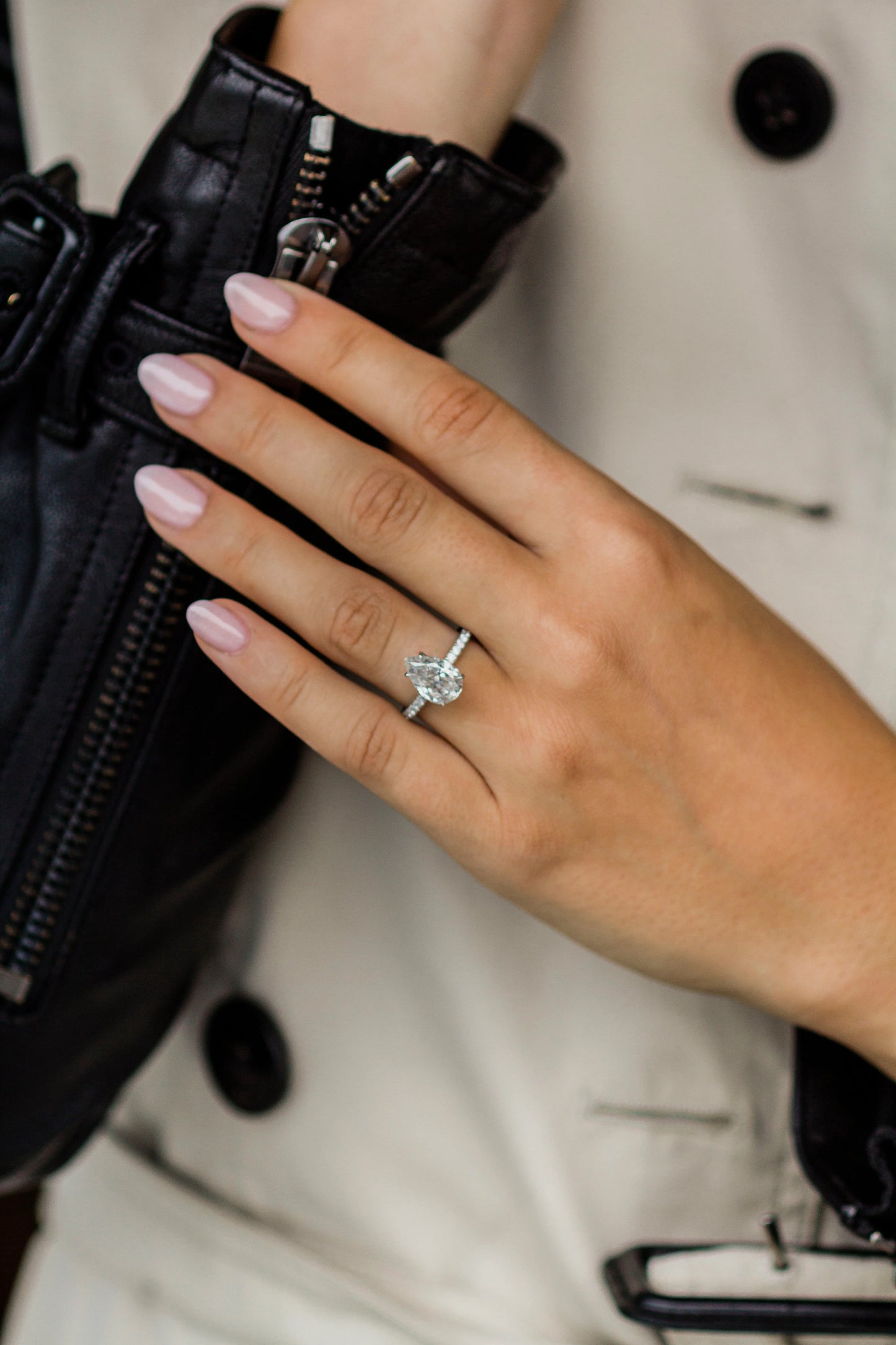 3 Carat Pear Cut Hidden Halo Moissanite Diamond Engagement Ring with a Pavé Band