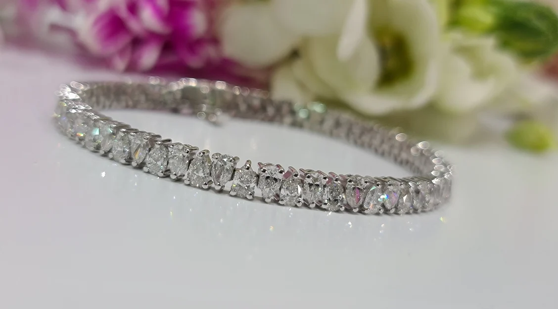 (7.5 CT TW) Pear Cut Tennis Bracelet