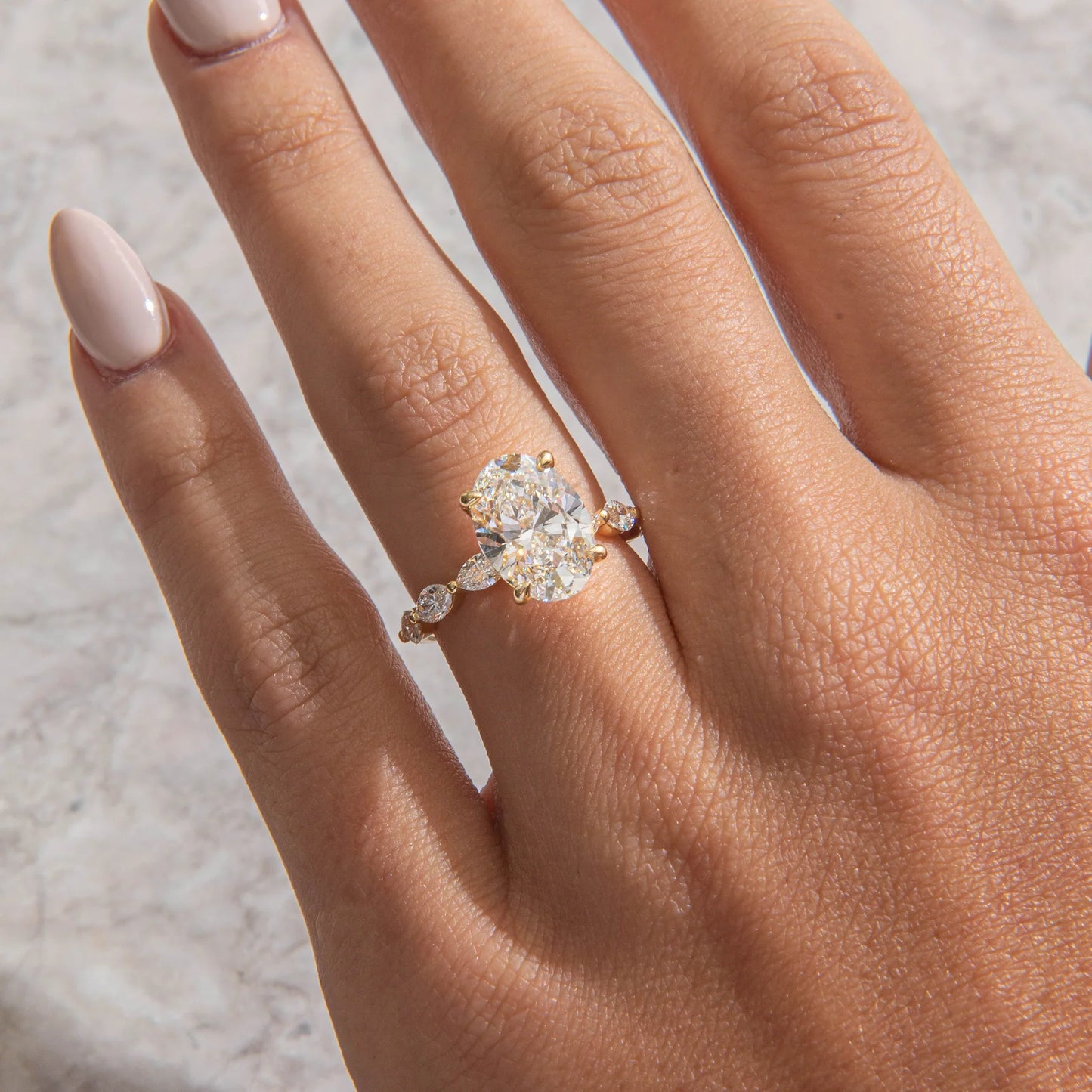 4.5 Carat Oval Cut with Marquise Band and Hidden Halo