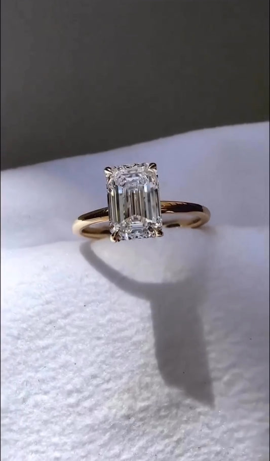 2 Carat Emerald Cut with a Solitaire Band