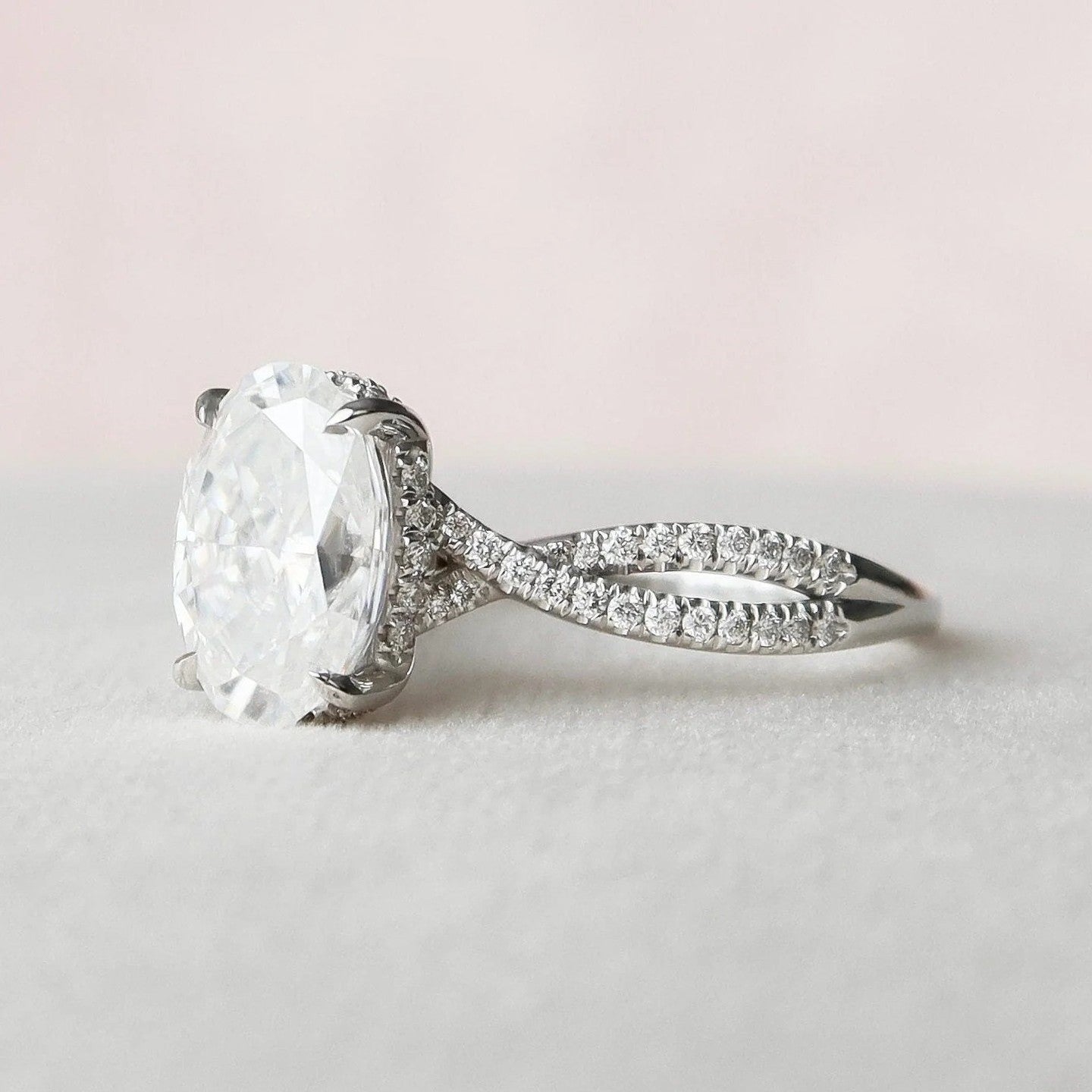 2.0 Carat Oval Cut Diamond Ring with Twisted Band and Pave Detail