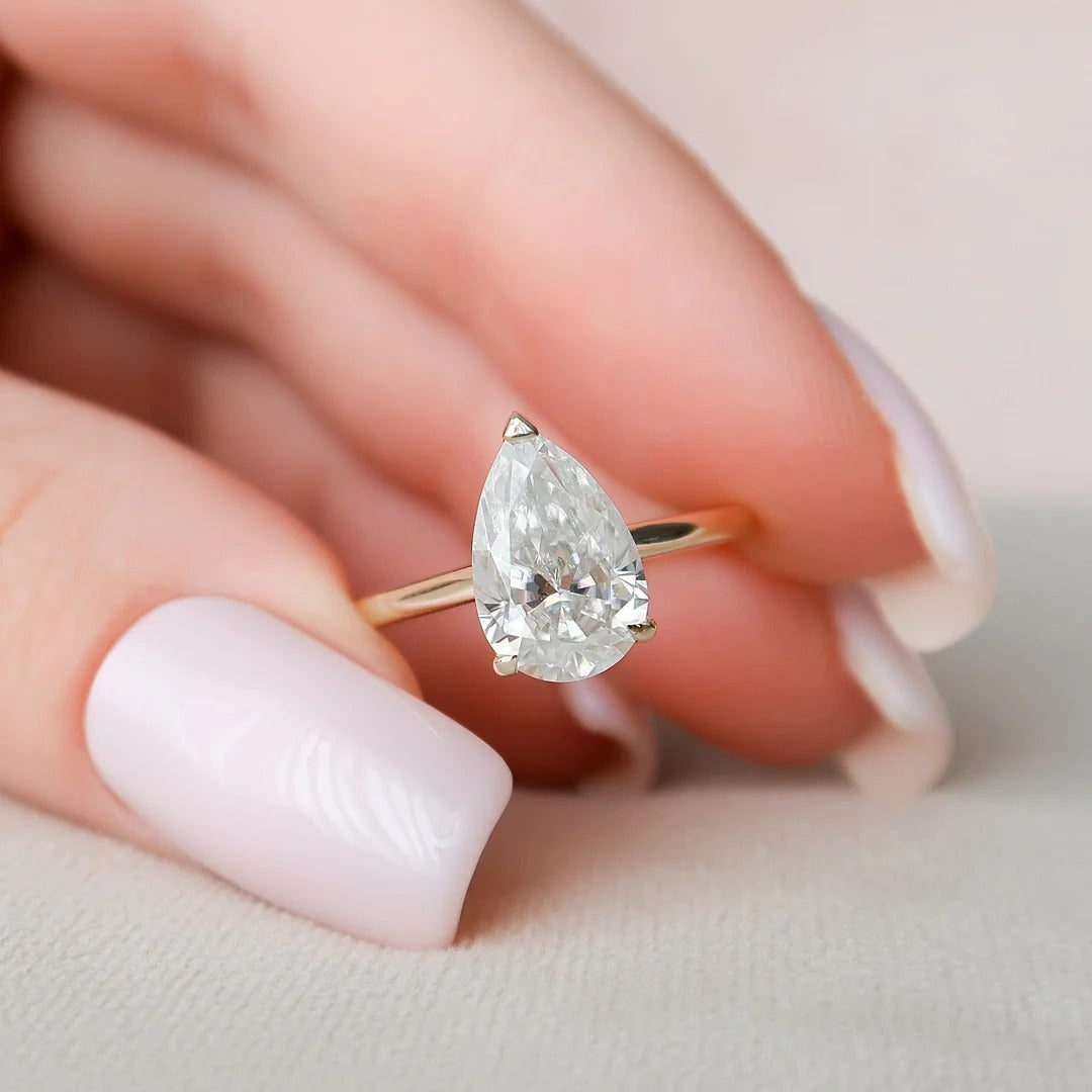 3 Carat Pear Cut with a Solitaire Band, Hidden Halo and Shoulder Accents – view 2
