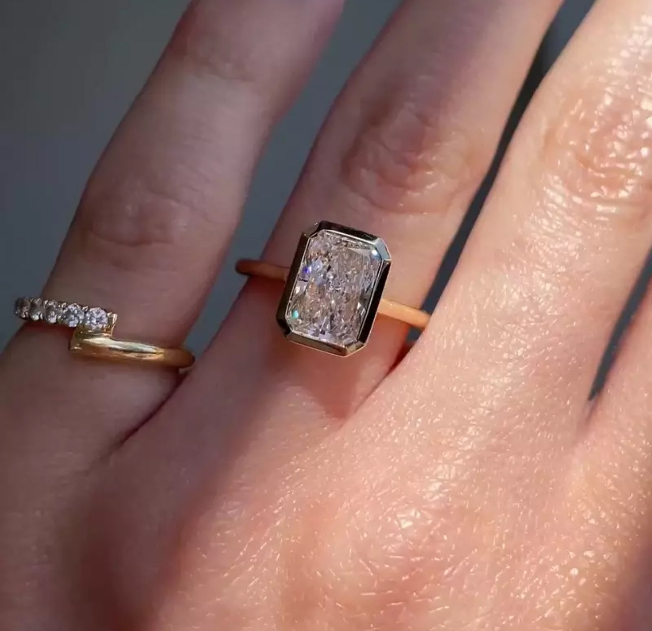 3 Carat Radiant Cut with a solitaire band and bezel setting