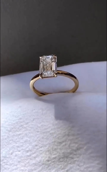 2 Carat Emerald Cut with a Solitaire Band