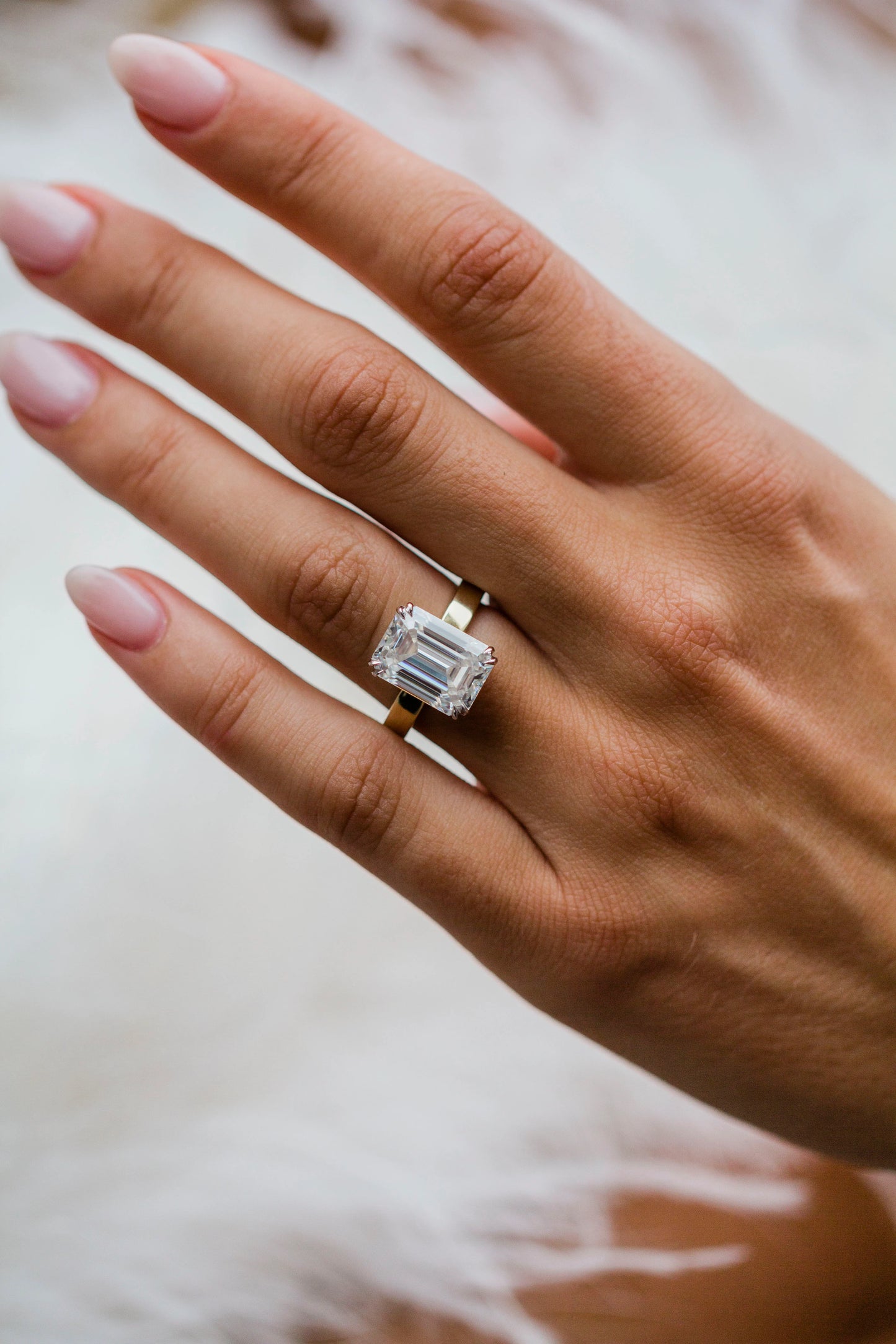 4 Carat Emerald Cut Moissanite Diamond Engagement Ring with a Squared Off Solitaire Band