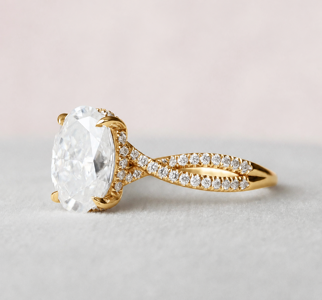 2.0 Carat Oval Cut Ring with Twisted Band and Pave Detail in yellow gold
