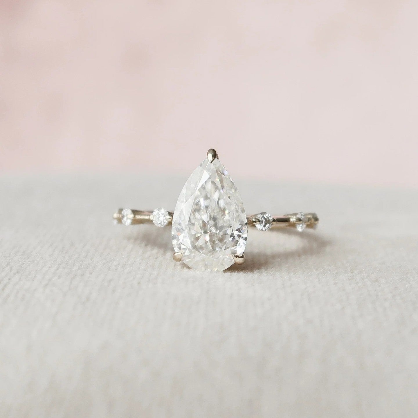 2.5 Carat Pear Cut Lab Diamond Ring with Round Accents